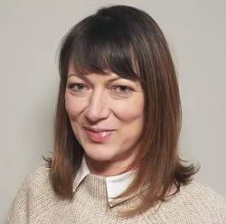 Corina Adelman
